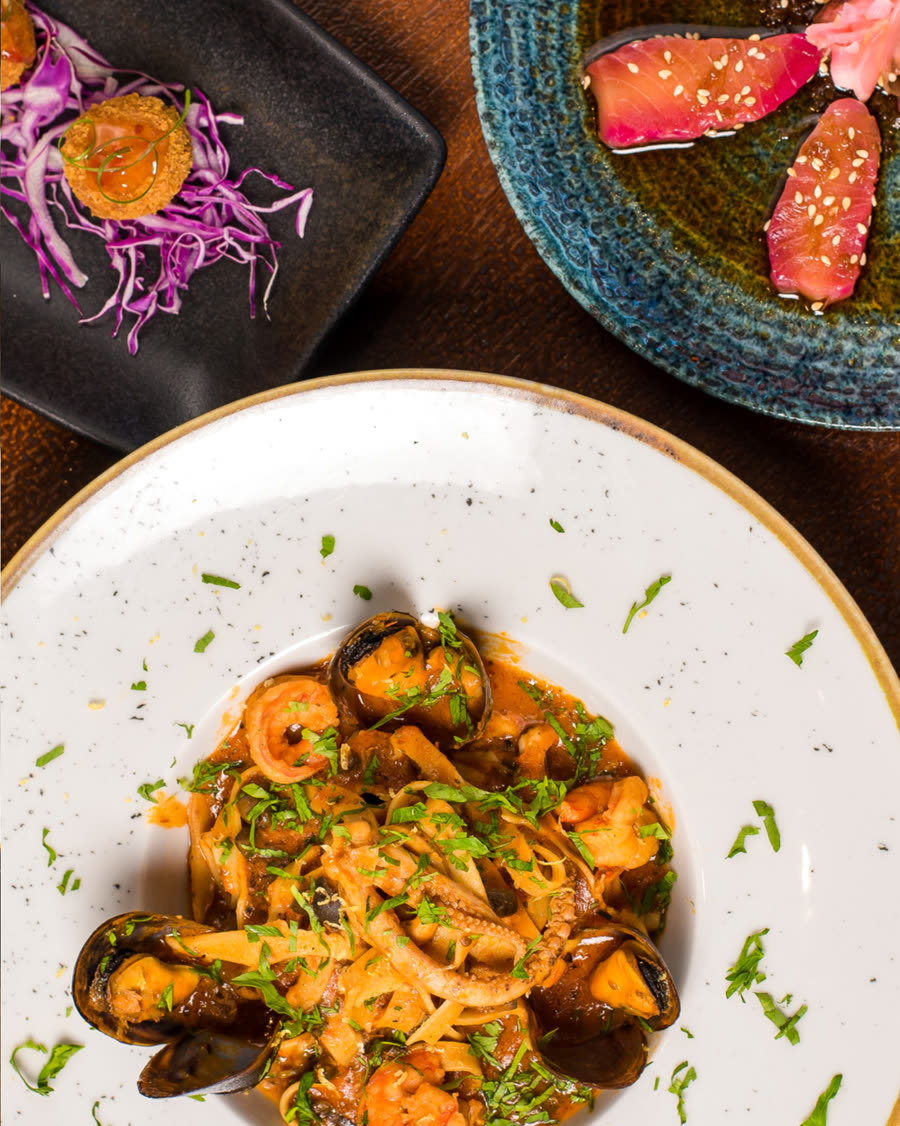 Seafood pasta with mussels and prawns, sashimi and croquettes at SALT